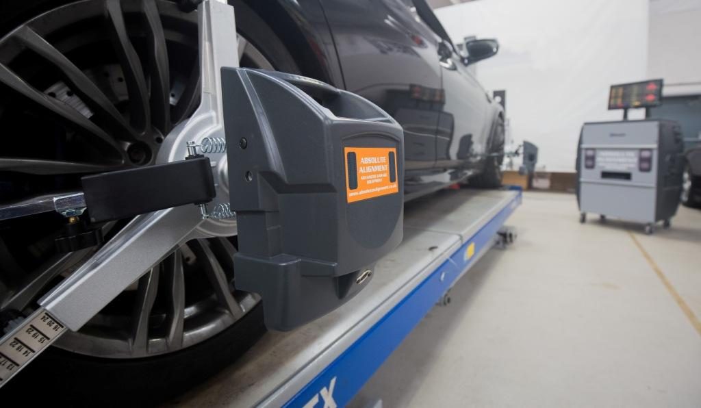 Absolute Alignment Bluetooth Pro wheel alignment equipment in use